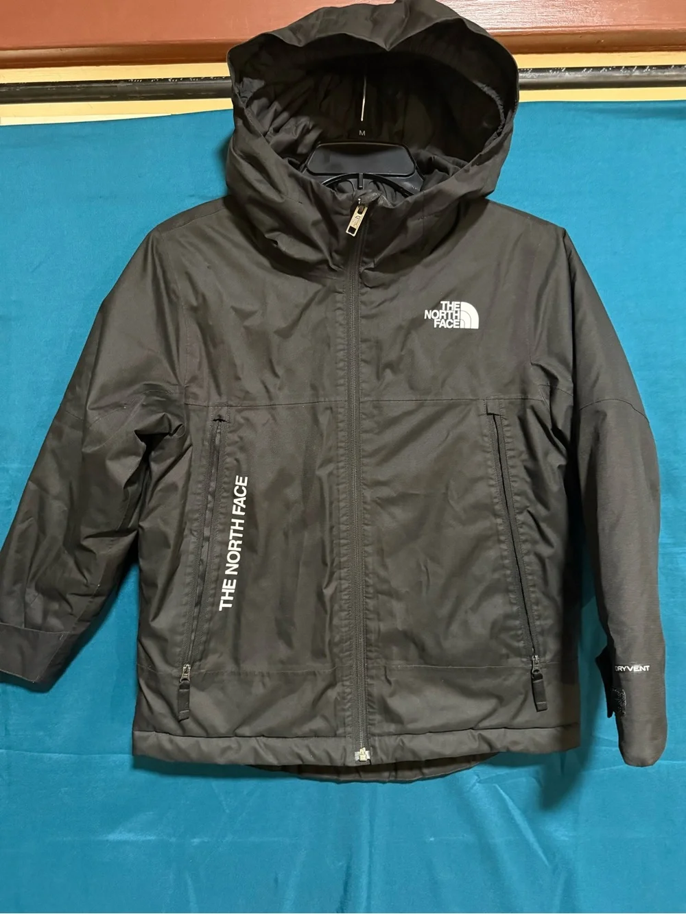 The North Face Kids Black Hooded Shell Jacket with White Logo